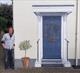 Trompe l'oeil door and lemon tree